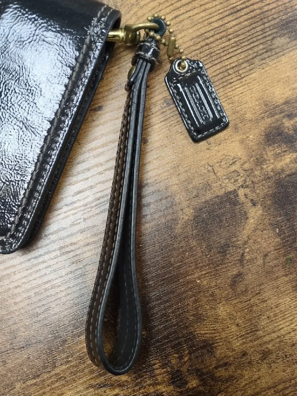 Coach Black Patent Leather Wallet with Gold Buckle Wristlet